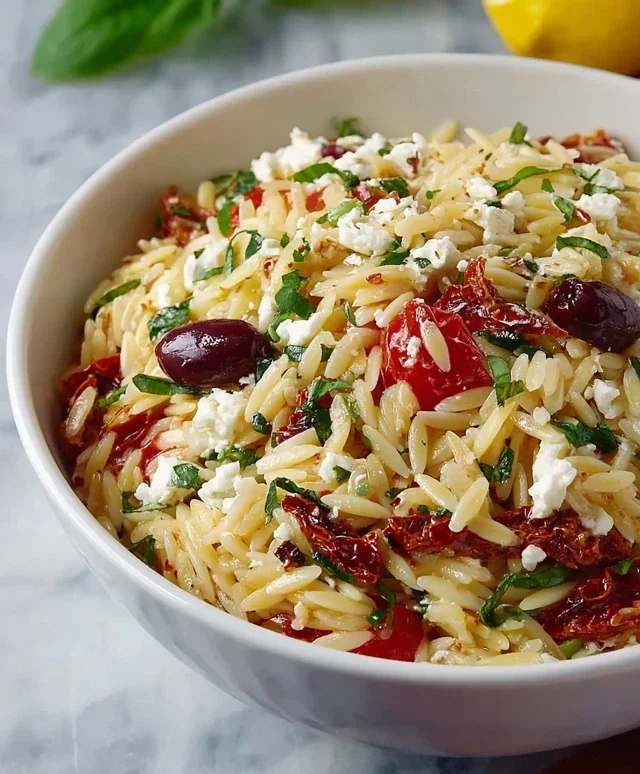 Homemade Orzo Pasta Salad with Feta and Sun Dried Tomatoes - FlirtyFood